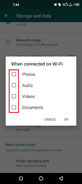 Uncheck all auto-download options for Wi-Fi in WhatsApp